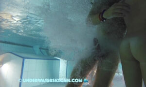 teen 18+ couple masturbates with the jet stream and she gets fingered in the sauna pool