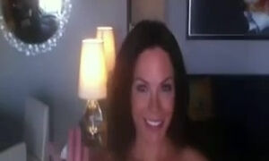 Wife Lorri services a huge dick